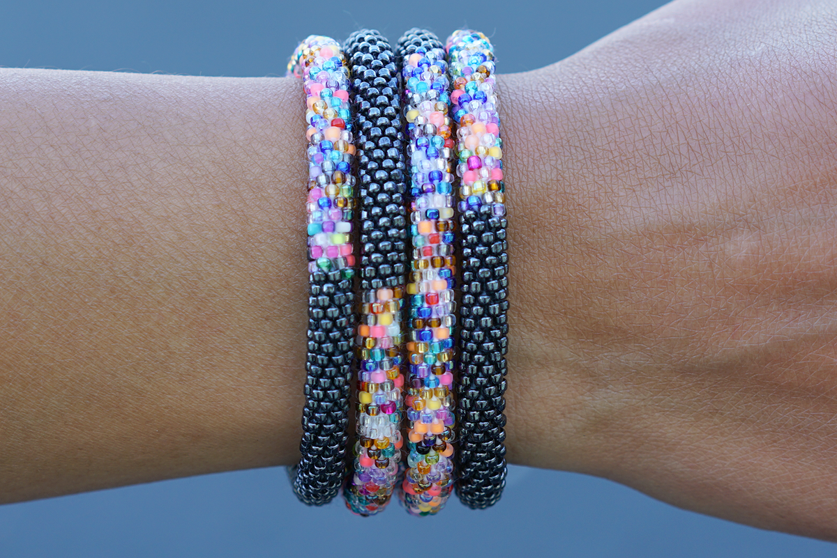Sashka Co handmade beaded friendship bracelet with silver confetti mix glass beads. Crafted in Nepal by skilled artisans in a half-and-half pattern.