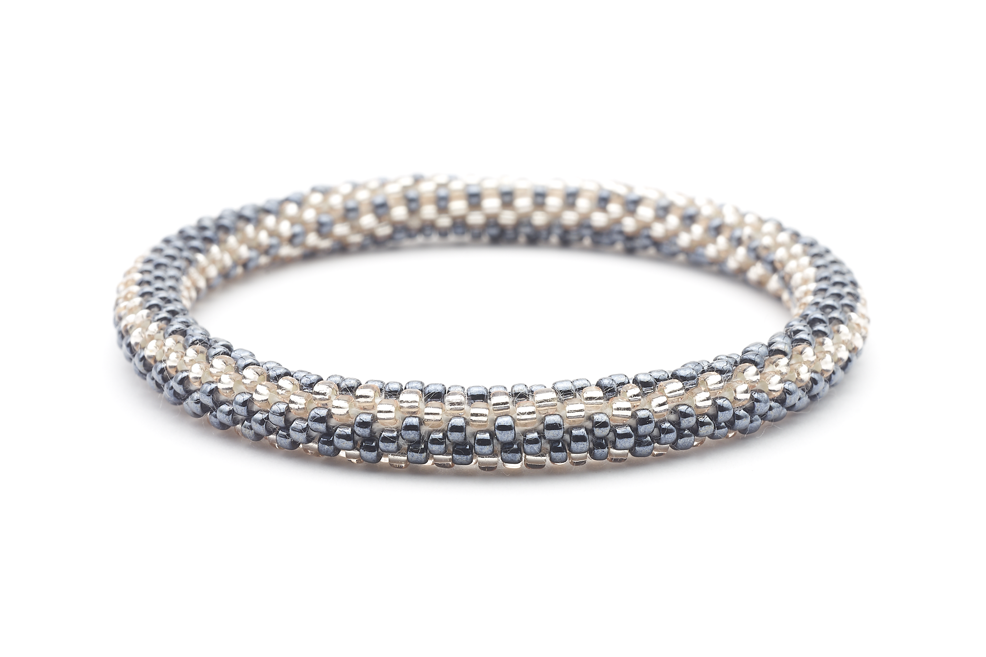 Sashka Co handmade beaded friendship bracelet with silver and rose gold glass beads. Crafted in Nepal by skilled artisans in a zipper pattern.

