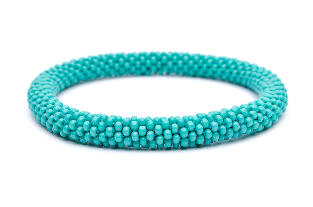 Sashka Co handmade beaded friendship bracelet with solid turquoise glass beads. Crafted in Nepal by skilled artisans.