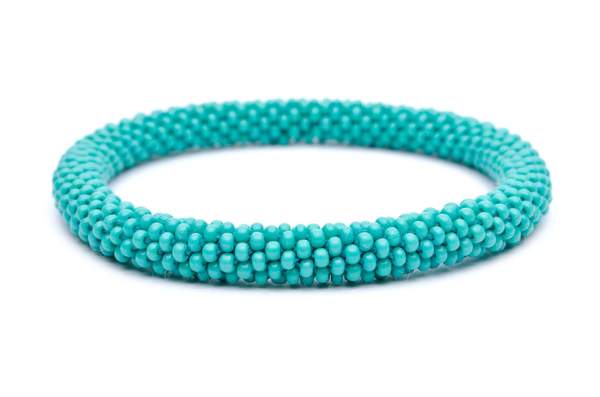 Sashka Co handmade beaded friendship bracelet with solid turquoise glass beads. Crafted in Nepal by skilled artisans.