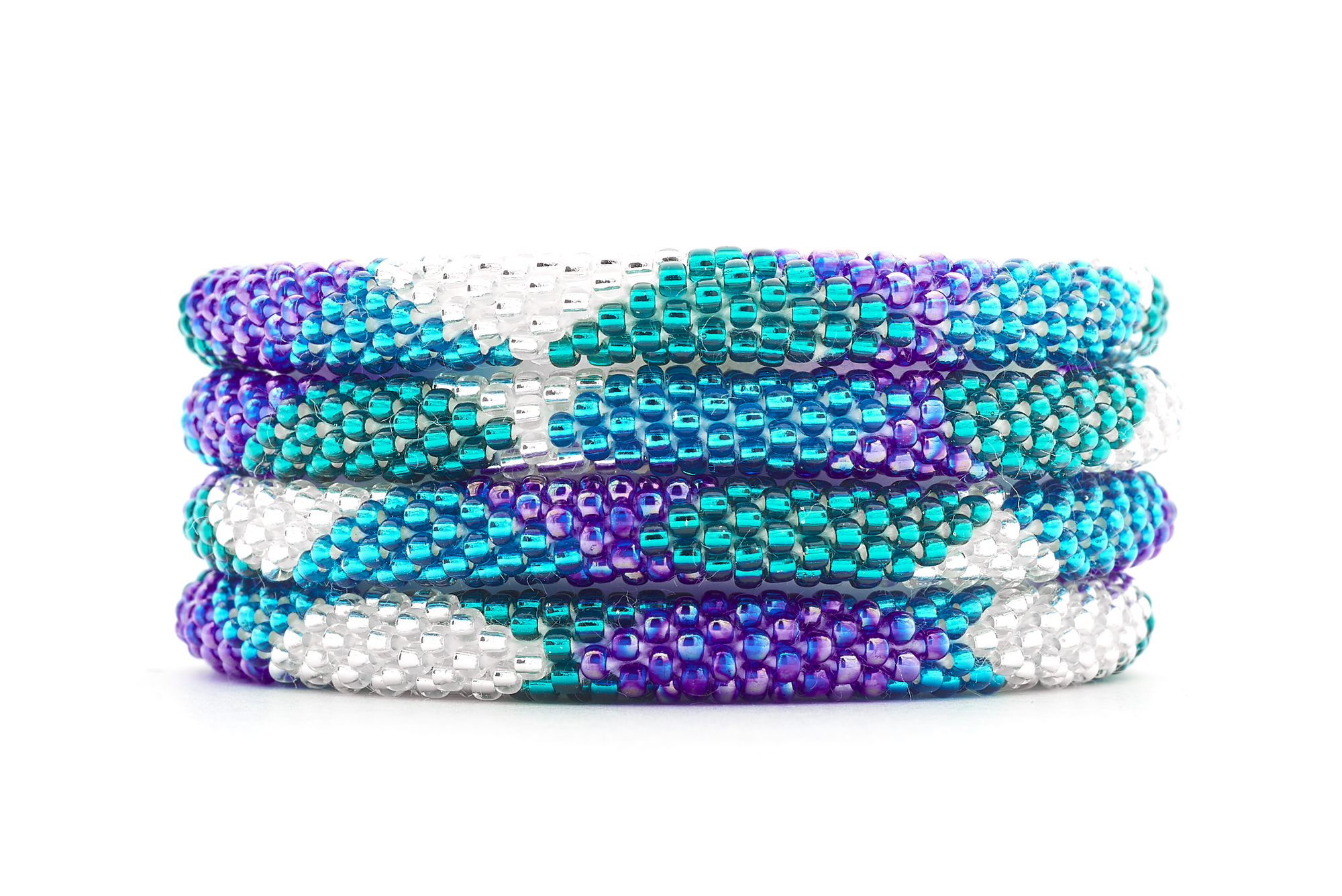 Sashka Co handmade beaded friendship bracelet with teal, clear, blue, and iridescent blue glass beads. Crafted in Nepal by skilled artisans in a large diamond pattern.