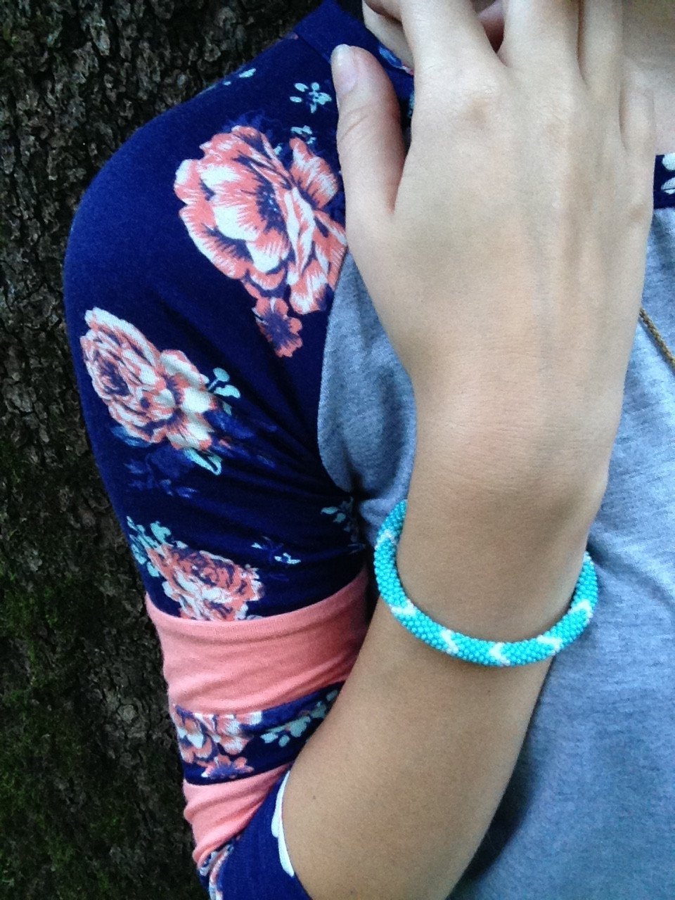 Sashka Co handmade beaded friendship bracelet with turquoise and gray glass beads. Crafted in Nepal by skilled artisans.