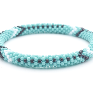 Sashka Co handmade beaded friendship bracelet with turquoise, white, and black glass beads. Crafted in Nepal by skilled artisans.