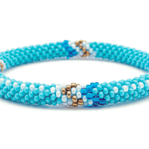 Sashka Co handmade beaded friendship bracelet with turquoise, white, bronze, and blue glass beads. Crafted in Nepal by skilled artisans in an arrow pattern.