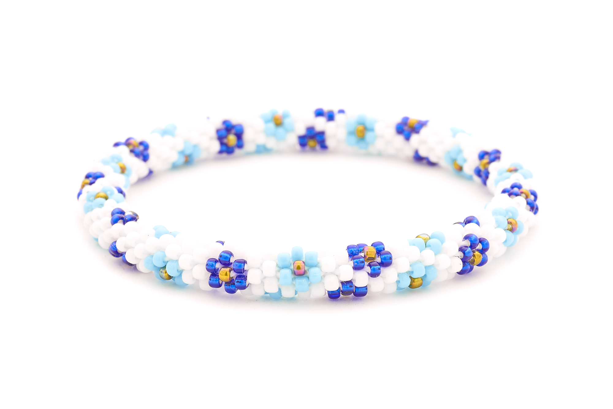 Sashka Co handmade beaded friendship bracelet with white, baby blue, blue, and iridescent flower pattern. Crafted in Nepal.