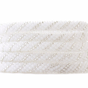 Sashka Co handmade beaded friendship bracelet with white and clear glass beads. Crafted in Nepal by skilled artisans in a spiral pattern.