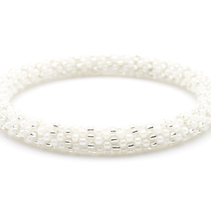 Sashka Co handmade beaded friendship bracelet with white and clear glass beads. Crafted in Nepal by skilled artisans in a detailed line pattern.