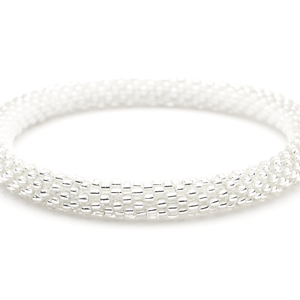 Sashka Co handmade beaded friendship bracelet with white and clear glass beads. Crafted in Nepal by skilled artisans in a horizontal half and half pattern.