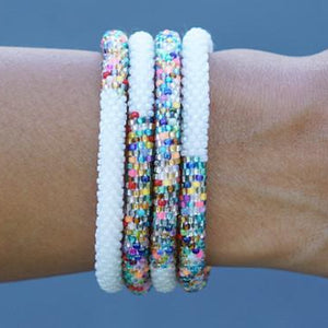 Sashka Co handmade beaded friendship bracelet with white and confetti mixed glass beads. Crafted in Nepal by skilled artisans in a half-and-half pattern.