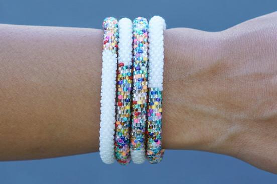 Sashka Co handmade beaded friendship bracelet with white and confetti mixed glass beads. Crafted in Nepal by skilled artisans in a half-and-half pattern.
