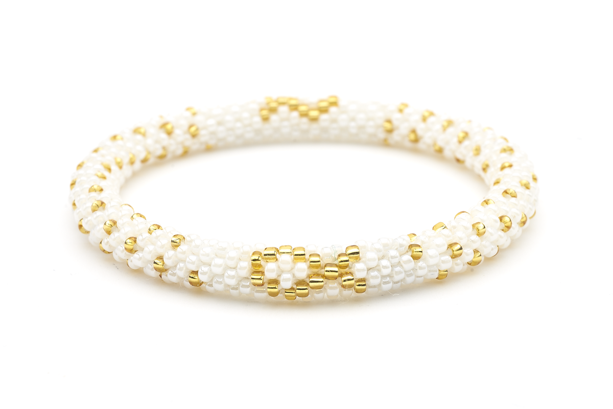 Sashka Co handmade beaded friendship bracelet with white and gold glass beads. Crafted in Nepal by skilled artisans in a cancer ribbon pattern.