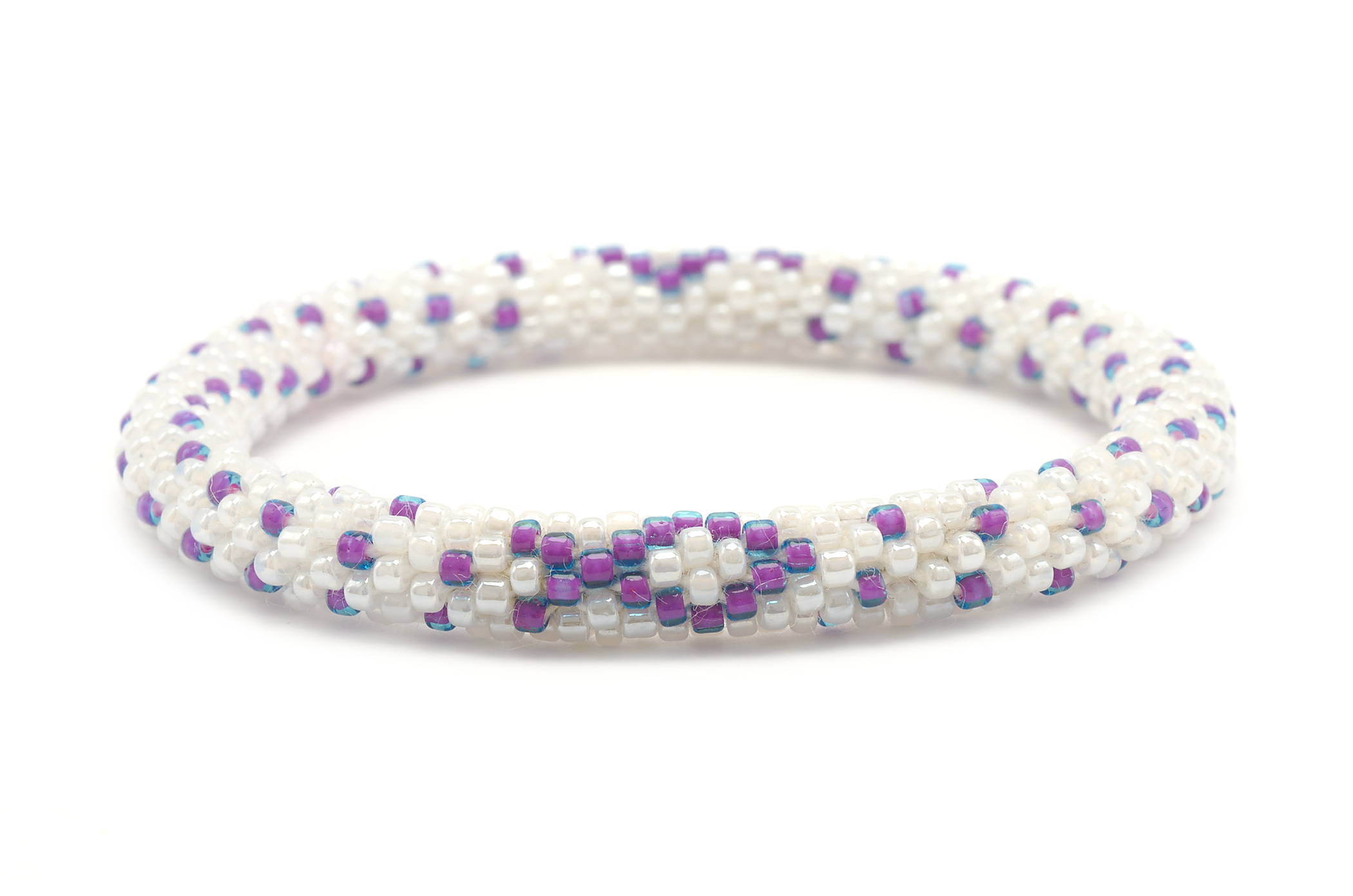 Sashka Co handmade beaded friendship bracelet with white and purple glass beads. Crafted in Nepal by skilled artisans in a cancer ribbon pattern.