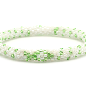 Handmade glass bead bracelet from Nepal, featuring a roll design. Also known as a beaded bracelet, seed bead bracelet, beach glass bracelet, or sea glass bracelet