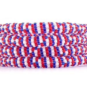 Handmade Beaded friendship bracelet with red, white and blue glass beads. Crafted by artisans in Nepal for Sashka Co.