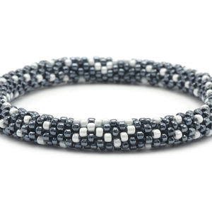 Handmade glass bead Silver w/ white ribbon design bracelet from Nepal, featuring a roll design. Also known as a beaded bracelet, seed bead bracelet, beach glass bracelet, or sea glass bracelet