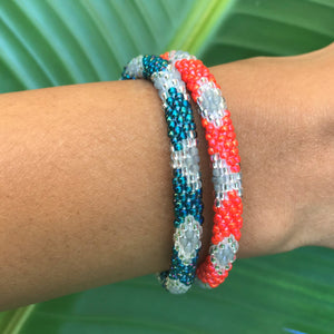Handmade glass bead bracelet from Nepal, featuring a roll design. Also known as a beaded bracelet, seed bead bracelet, beach glass bracelet, or sea glass bracelet