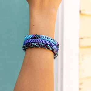 Handmade glass bead bracelet from Nepal, featuring a roll design. Also known as a beaded bracelet, seed bead bracelet, beach glass bracelet, or sea glass bracelet