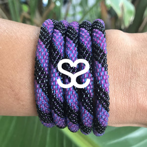 Handmade glass bead bracelet from Nepal, featuring a roll design. Also known as a beaded bracelet, seed bead bracelet, beach glass bracelet, or sea glass bracelet