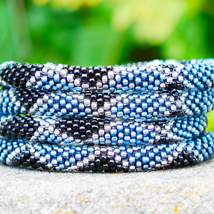 Handmade glass bead bracelet from Nepal, featuring a roll design. Also known as a beaded bracelet, seed bead bracelet, beach glass bracelet, or sea glass bracelet.