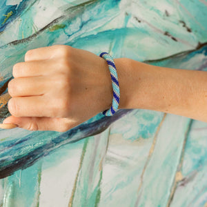 Handmade glass bead bracelet from Nepal, featuring a roll design. Also known as a beaded bracelet, seed bead bracelet, beach glass bracelet, or sea glass bracelet.