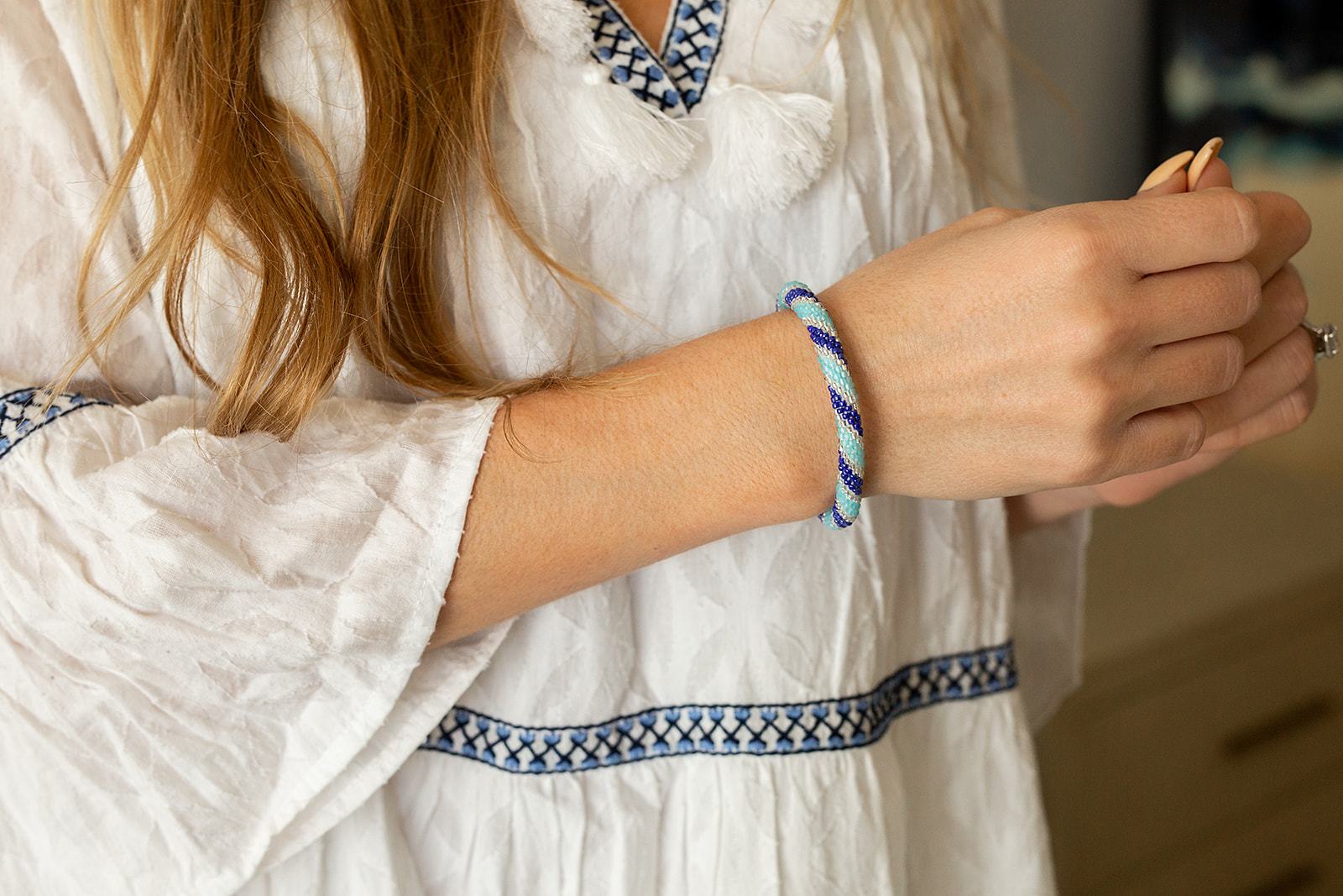 Handmade glass bead bracelet from Nepal, featuring a roll design. Also known as a beaded bracelet, seed bead bracelet, beach glass bracelet, or sea glass bracelet.