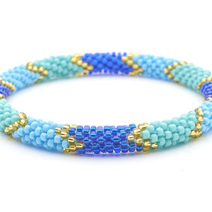 Handmade glass bead bracelet from Nepal, featuring a roll design. Also known as a beaded bracelet, seed bead bracelet, beach glass bracelet, or sea glass bracelet