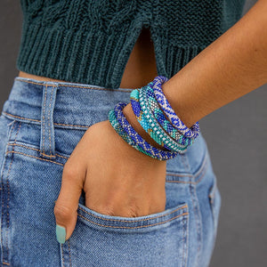 Handmade glass bead bracelet from Nepal, featuring a roll design. Also known as a beaded bracelet, seed bead bracelet, beach glass bracelet, or sea glass bracelet