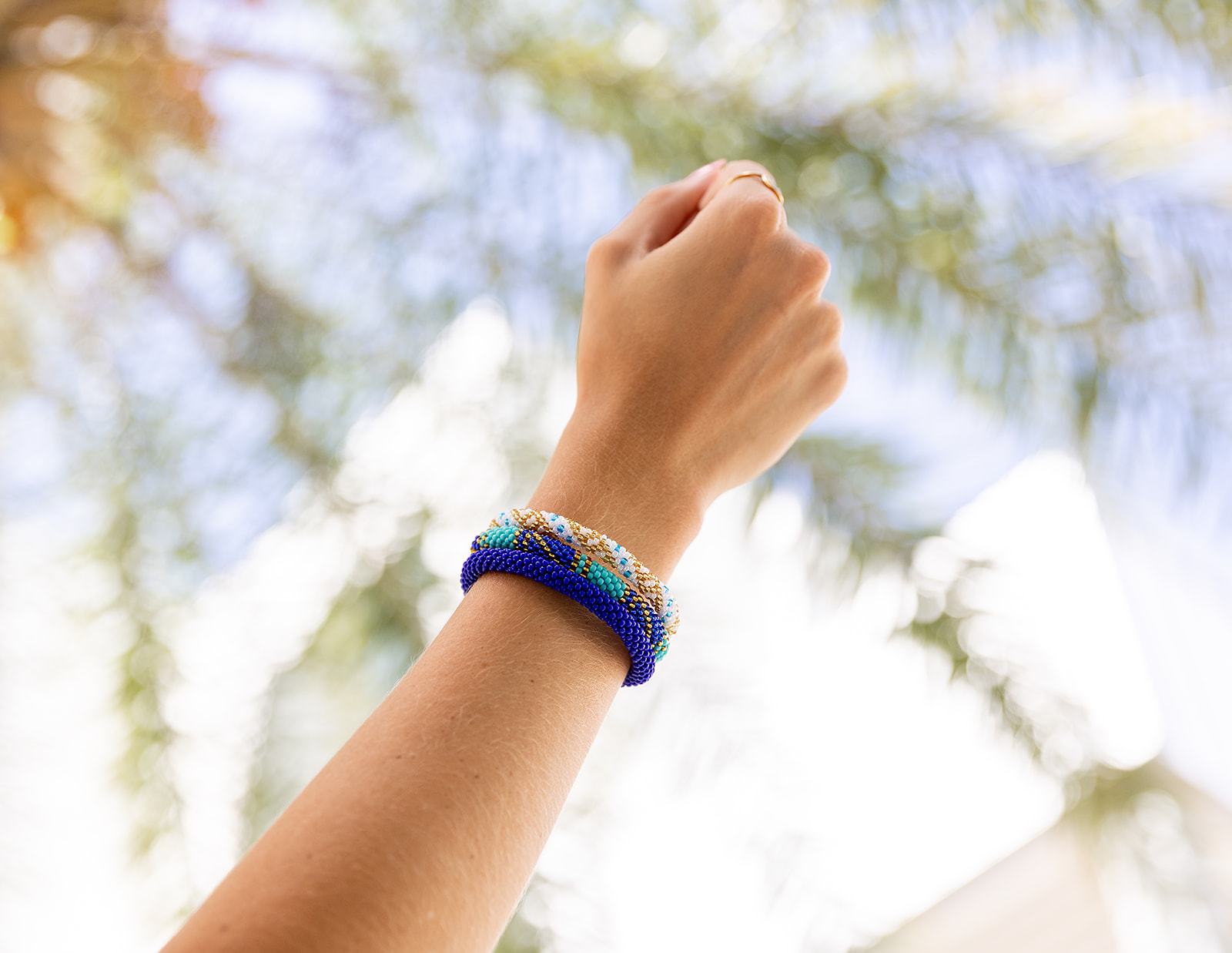 Handmade glass bead bracelet from Nepal, featuring a roll design. Also known as a beaded bracelet, seed bead bracelet, beach glass bracelet, or sea glass bracelet.