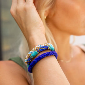 Handmade glass bead bracelet from Nepal, featuring a roll design. Also known as a beaded bracelet, seed bead bracelet, beach glass bracelet, or sea glass bracelet.