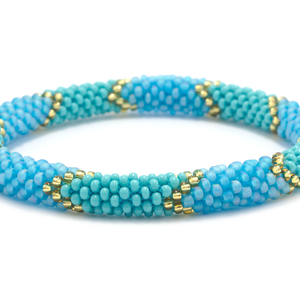 Handmade glass bead bracelet from Nepal, featuring a roll design. Also known as a beaded bracelet, seed bead bracelet, beach glass bracelet, or sea glass bracelet.