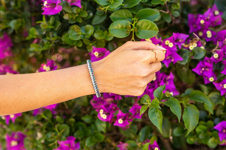 Handmade glass bead bracelet from Nepal, featuring a roll design. Also known as a beaded bracelet, seed bead bracelet, beach glass bracelet, or sea glass bracelet.