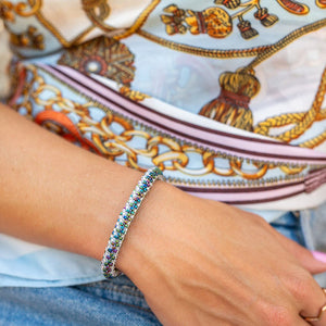 Handmade glass bead bracelet from Nepal, featuring a roll design. Also known as a beaded bracelet, seed bead bracelet, beach glass bracelet, or sea glass bracelet.