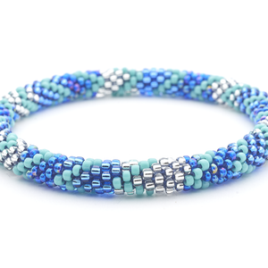 Handmade glass bead bracelet from Nepal, featuring a roll design. Also known as a beaded bracelet, seed bead bracelet, beach glass bracelet, or sea glass bracelet