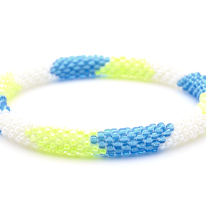 Handmade glass bead bracelet from Nepal, featuring a roll design. Also known as a beaded bracelet, seed bead bracelet, beach glass bracelet, or sea glass bracelet.