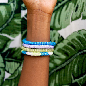 Handmade glass bead bracelet from Nepal, featuring a roll design. Also known as a beaded bracelet, seed bead bracelet, beach glass bracelet, or sea glass bracelet.
