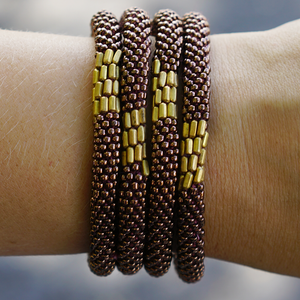 Handmade glass bead bracelet from Nepal, featuring a roll design. Also known as a beaded bracelet, seed bead bracelet, beach glass bracelet, or sea glass bracelet.