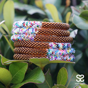 Handmade glass bead bracelet from Nepal, featuring a roll design. Also known as a beaded bracelet, seed bead bracelet, beach glass bracelet, or sea glass bracelet