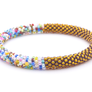 Handmade glass bead bracelet from Nepal, featuring a roll design. Also known as a beaded bracelet, seed bead bracelet, beach glass bracelet, or sea glass bracelet