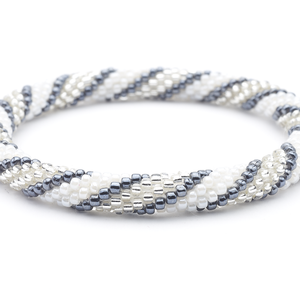 Handmade glass bead bracelet from Nepal, featuring a roll design. Also known as a beaded bracelet, seed bead bracelet, beach glass bracelet, or sea glass bracelet.
