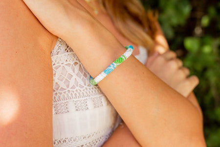 Handmade glass bead bracelet from Nepal, featuring a roll design. Also known as a beaded bracelet, seed bead bracelet, beach glass bracelet, or sea glass bracelet.