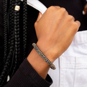 Handmade glass bead bracelet from Nepal, featuring a roll design. Also known as a beaded bracelet, seed bead bracelet, beach glass bracelet, or sea glass bracelet.