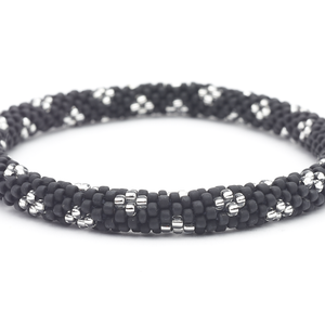 Handmade glass bead bracelet from Nepal, featuring a roll design. Also known as a beaded bracelet, seed bead bracelet, beach glass bracelet, or sea glass bracelet.