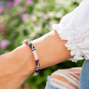 Handmade glass bead bracelet from Nepal, featuring a roll design. Also known as a beaded bracelet, seed bead bracelet, beach glass bracelet, or sea glass bracelet.