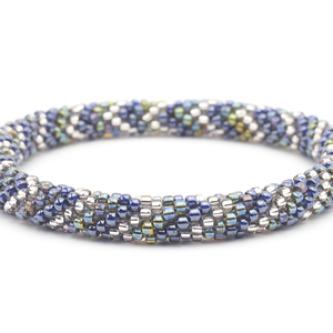 Handmade glass bead bracelet from Nepal, featuring a roll design. Also known as a beaded bracelet, seed bead bracelet, beach glass bracelet, or sea glass bracelet.