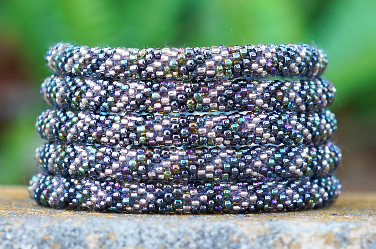 Handmade glass bead bracelet from Nepal, featuring a roll design. Also known as a beaded bracelet, seed bead bracelet, beach glass bracelet, or sea glass bracelet.