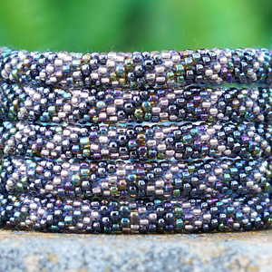 Handmade glass bead bracelet from Nepal, featuring a roll design. Also known as a beaded bracelet, seed bead bracelet, beach glass bracelet, or sea glass bracelet.