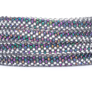 Handmade glass bead bracelet from Nepal, featuring a roll design. Also known as a beaded bracelet, seed bead bracelet, beach glass bracelet, or sea glass bracelet.