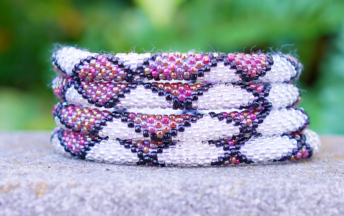 Handmade glass bead bracelet from Nepal, featuring a roll design. Also known as a beaded bracelet, seed bead bracelet, beach glass bracelet, or sea glass bracelet.