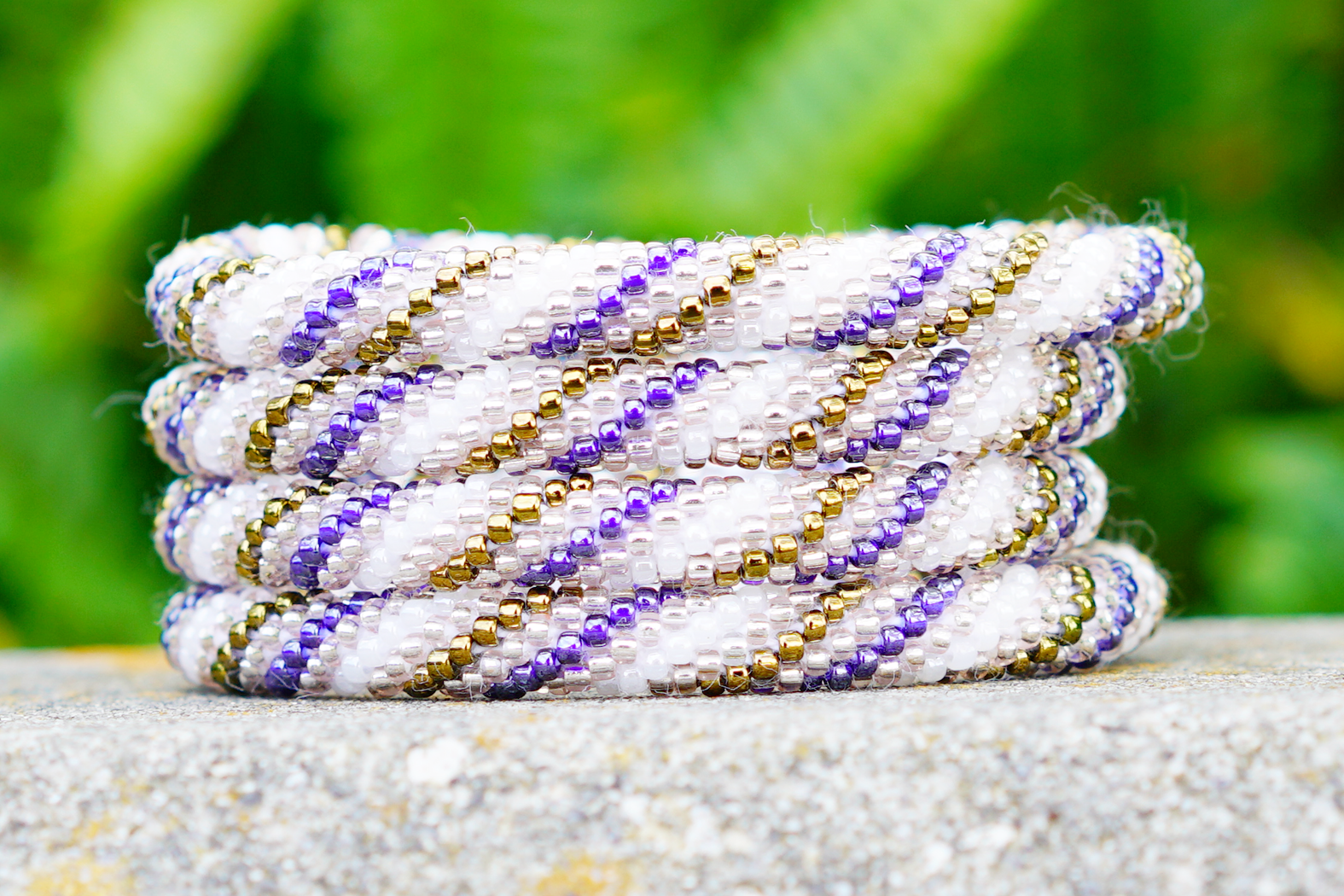 Handmade glass bead bracelet from Nepal, featuring a roll design. Also known as a beaded bracelet, seed bead bracelet, beach glass bracelet, or sea glass bracelet