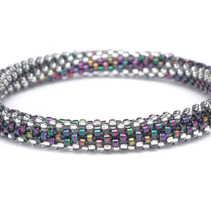 Handmade glass bead bracelet from Nepal, featuring a roll design. Also known as a beaded bracelet, seed bead bracelet, beach glass bracelet, or sea glass bracelet.